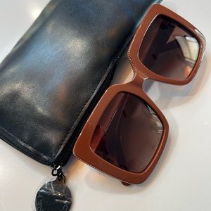 Stella Mcartney chain sunglasses.